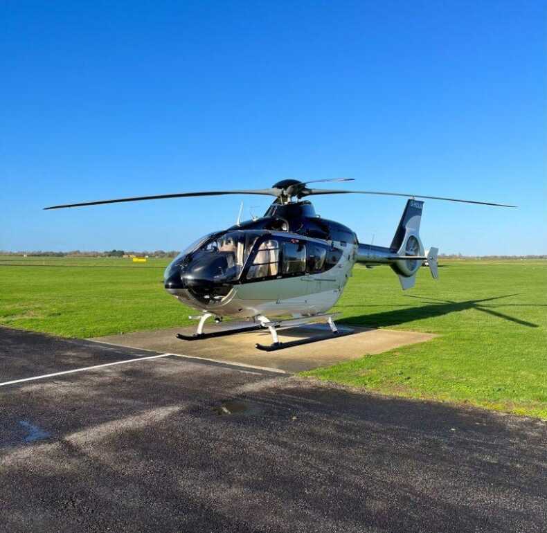 Ec135 t2 helicopter on heli pad